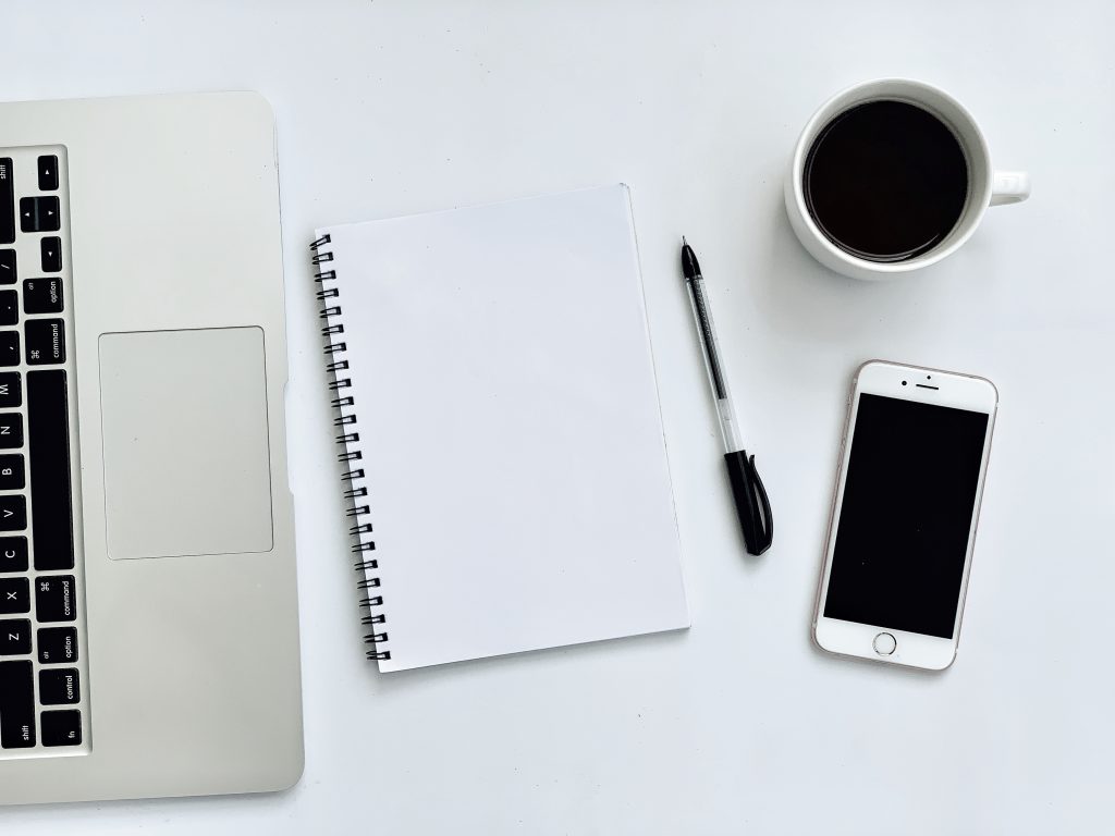 A business owner using an SME website builder to create a professional website easily.